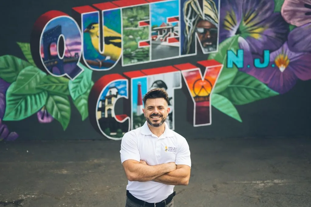 Real Estate Investor standing in front of Plainfield NJ mural
